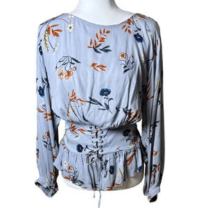 ILLA ILLA Light Blue Floral Lace-Up Peplum Blouse